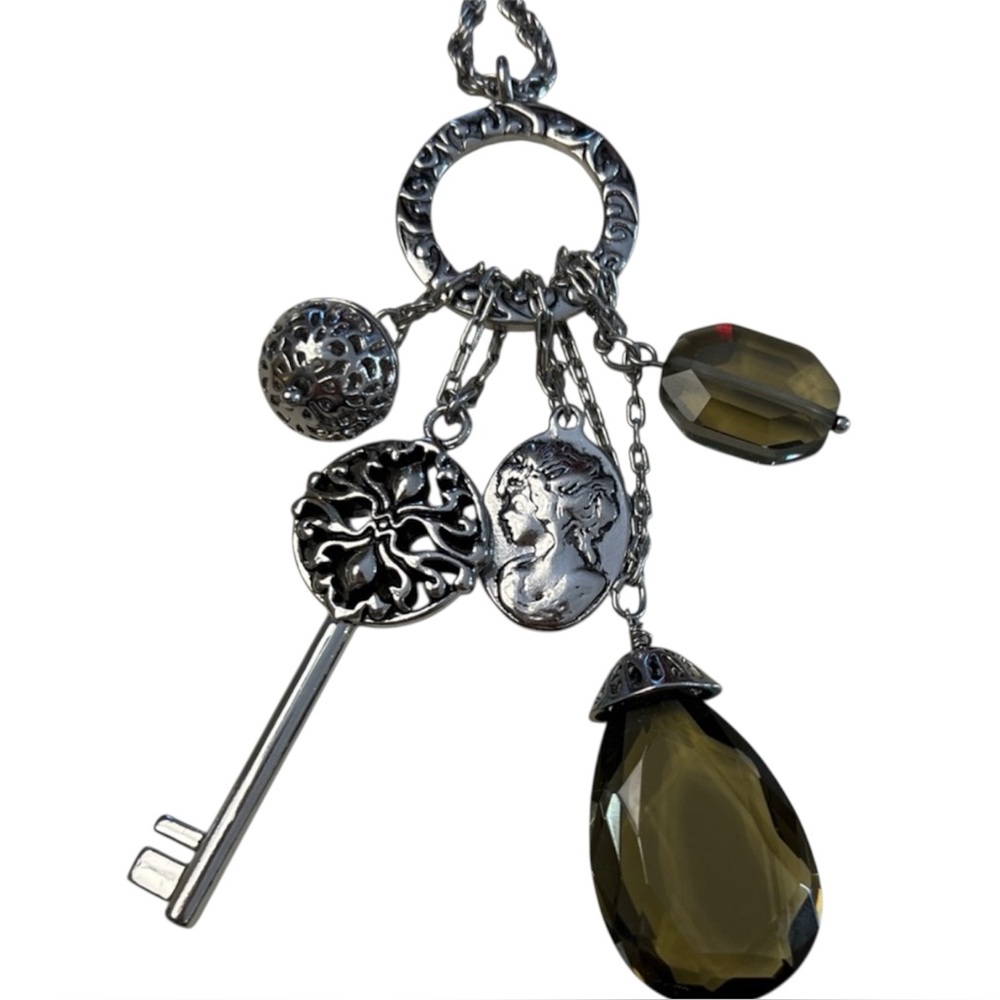Lia Sophia Reach long silver-tone charm necklace featuring smoky glass